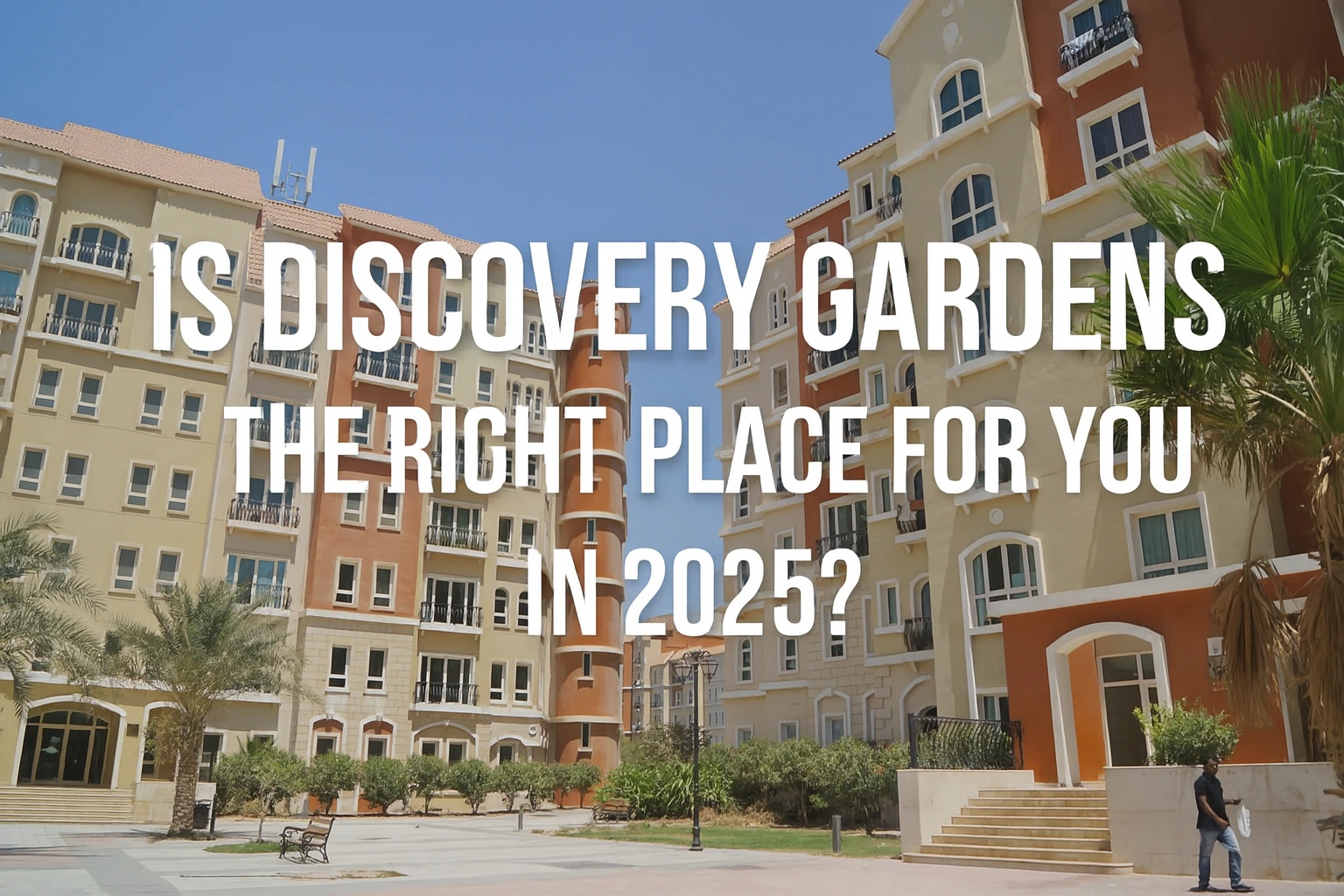 Discovery Gardens Dubai community buildings with Mediterranean-style architecture and palm trees, featuring the blog title “Is Discovery Gardens the Right Place for You in 2025?” overlaid on the image.